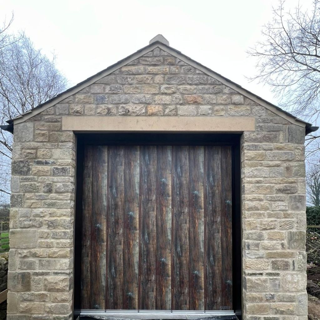A Hormann HST Side Sliding Door in Duragrain Burned Oak